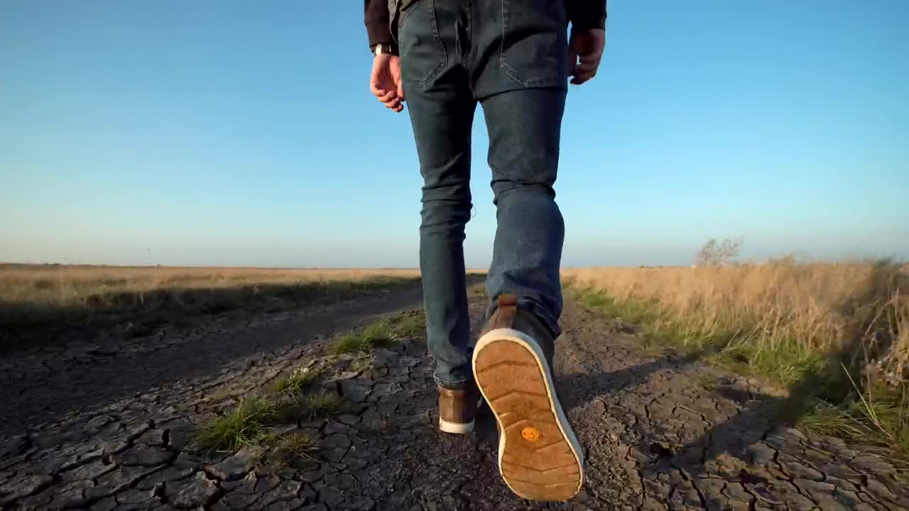 Stock Video A Man Walking On A Dirt Road Live Wallpaper For PC