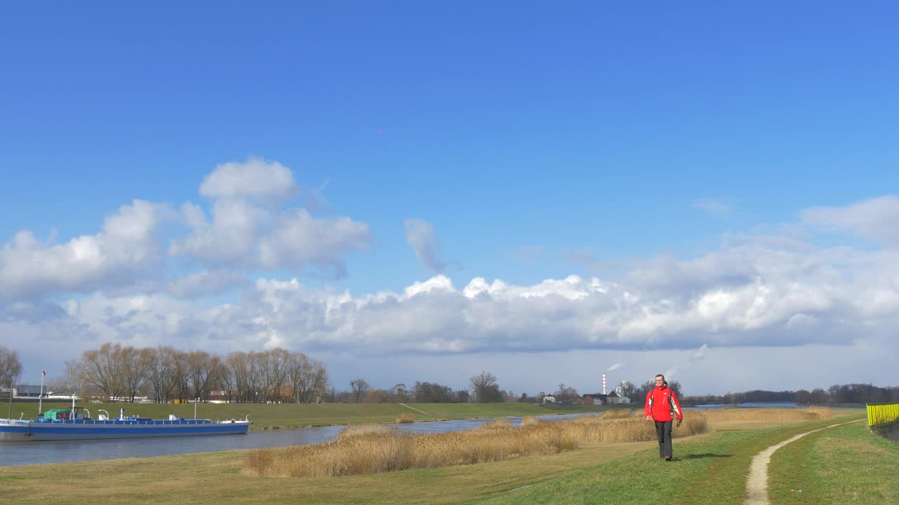 Stock Video A Man Walking By The Riverside Live Wallpaper For PC