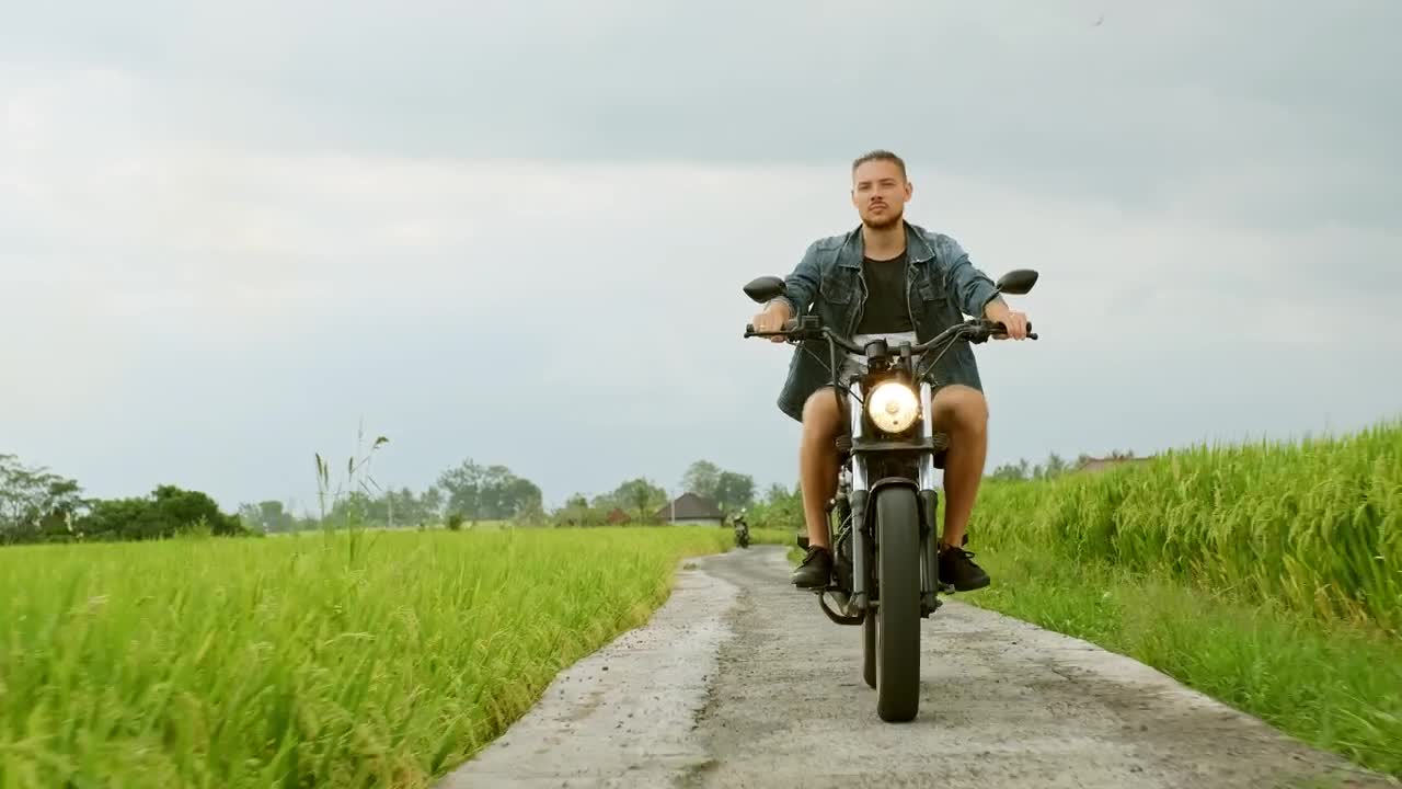Stock Video A Man Riding A Bicycle Near A Farm In The Live Wallpaper For PC