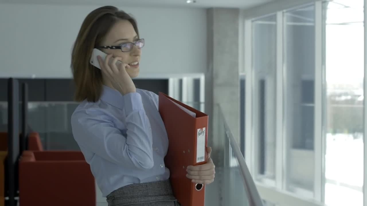 Stock Video Business Woman Talking On The Phone In The Office Live Wallpaper For PC