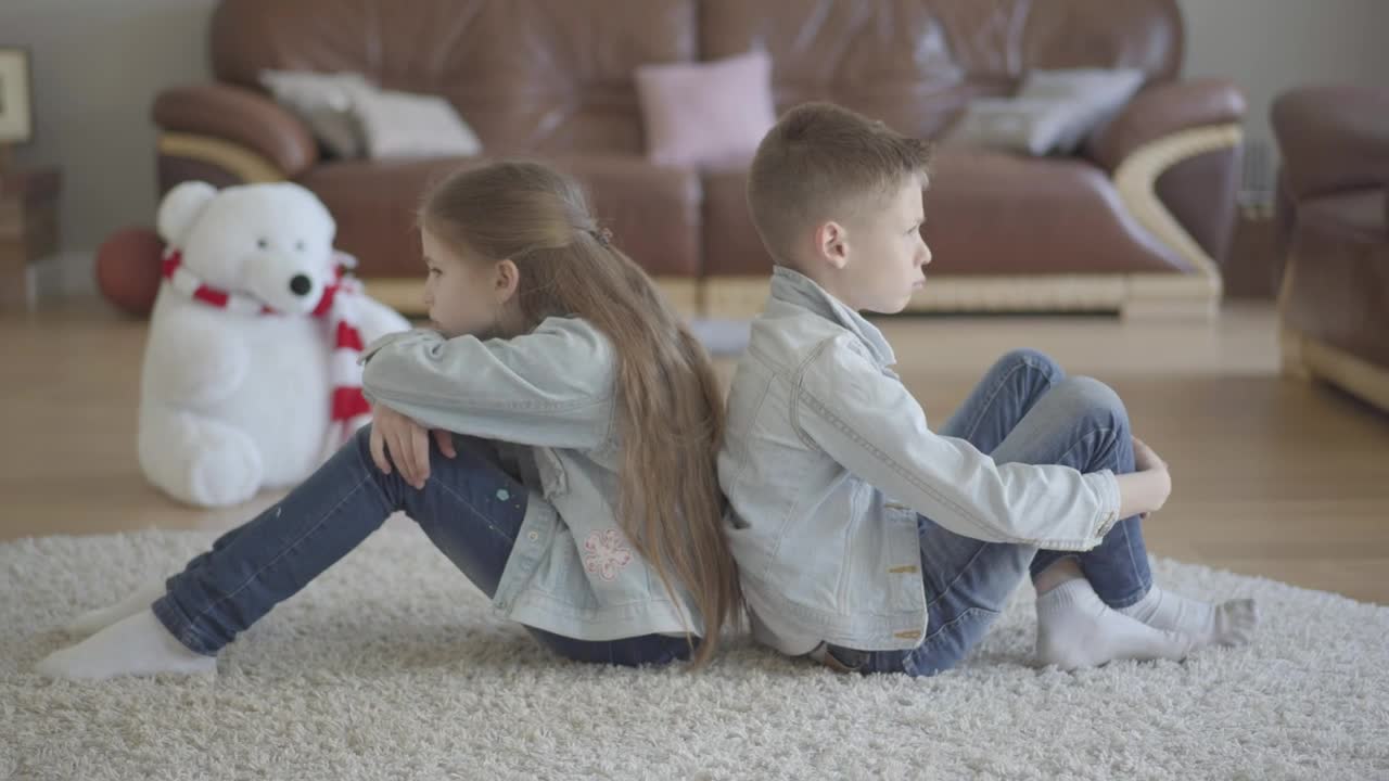 Stock Video Brothers Sitting On Their Backs Annoyed Live Wallpaper For PC