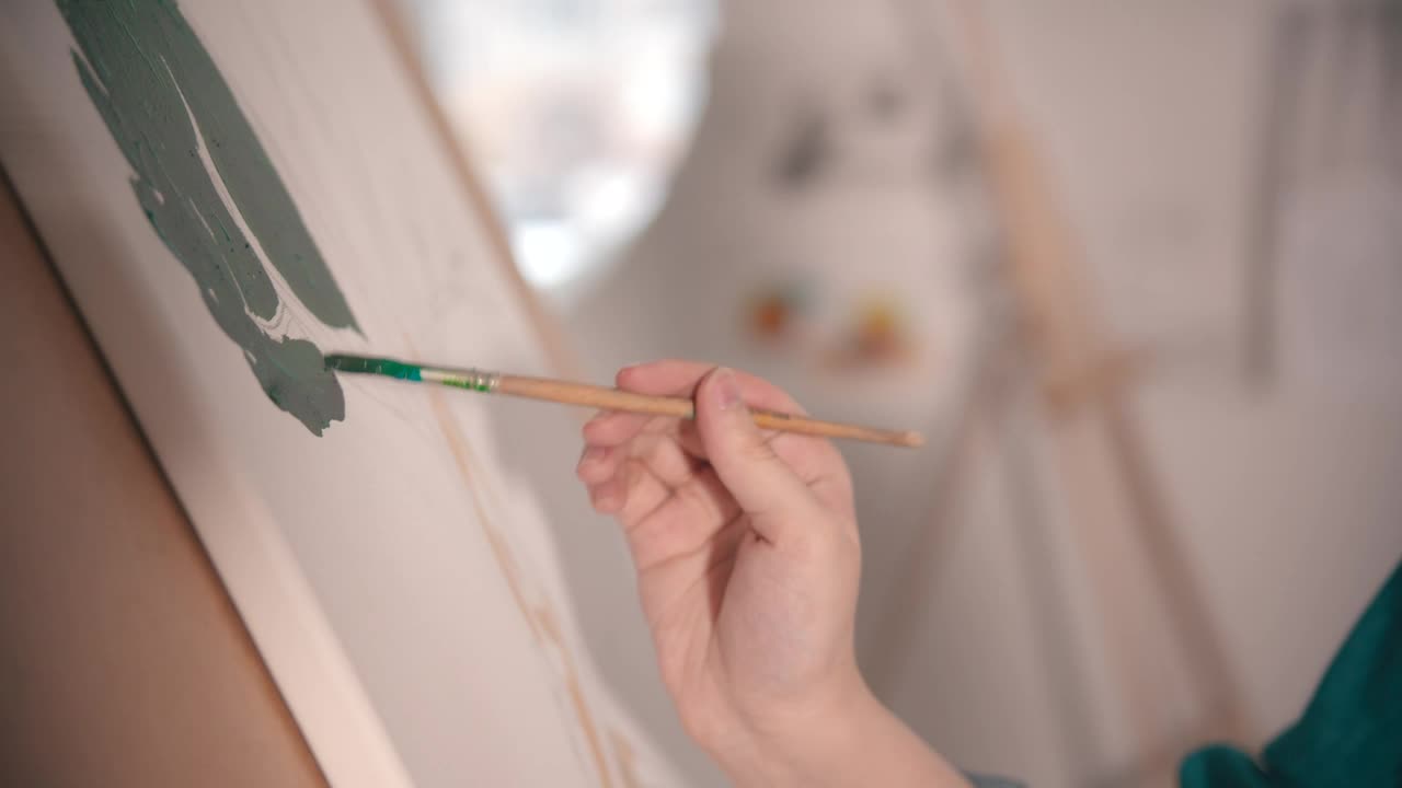 Stock Video Blonde Artist Painting On Canvas Live Wallpaper For PC
