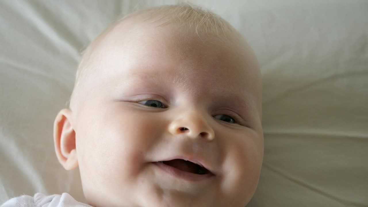 Video Stock Closeup Of Smiling Baby On White Background Live Wallpaper For PC