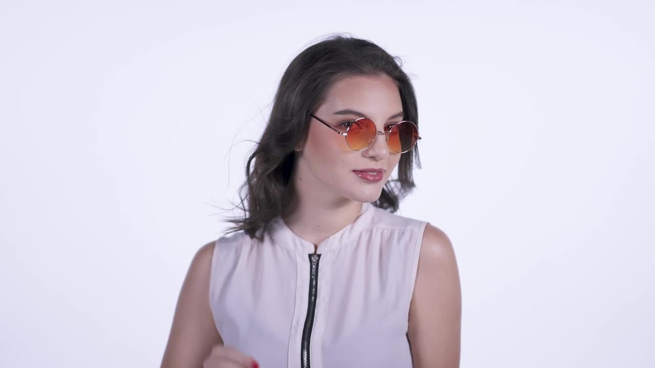 Video Stock Captivating Woman With Glasses On A White Background Live Wallpaper For PC