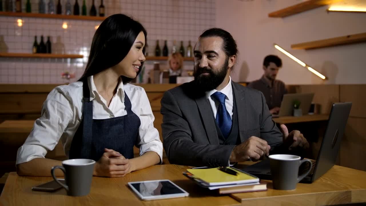 Video Stock Cafe Owner Discussing Business Live Wallpaper For PC