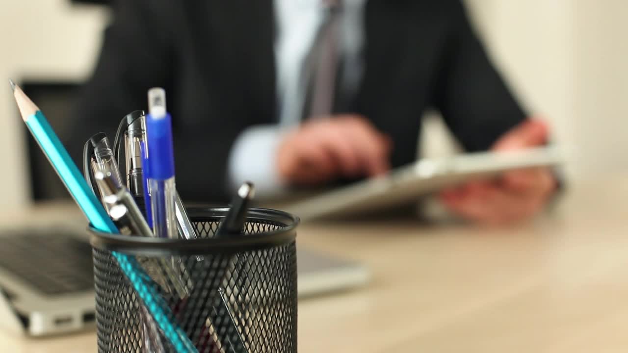 Video Stock Businessman In His Office Working On A Tablet Live Wallpaper For PC