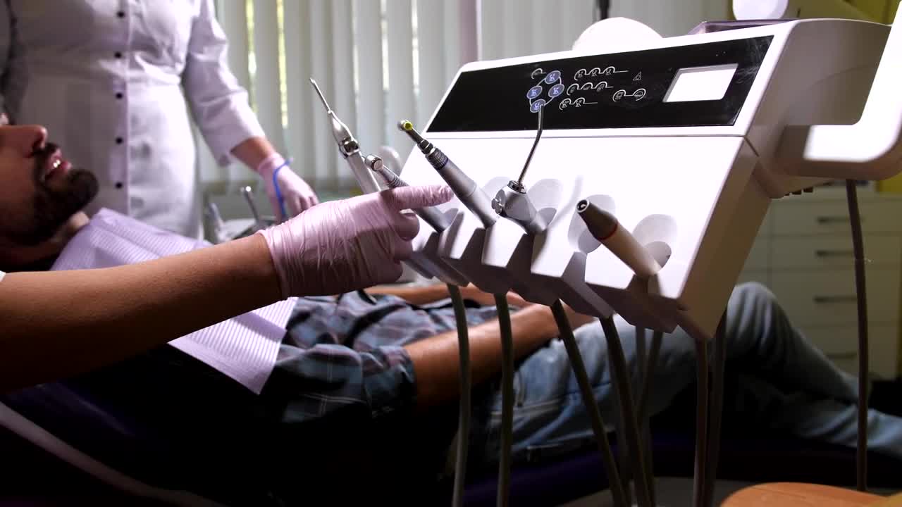 Stock Video Dentist Selecting A Drill Live Wallpaper For PC