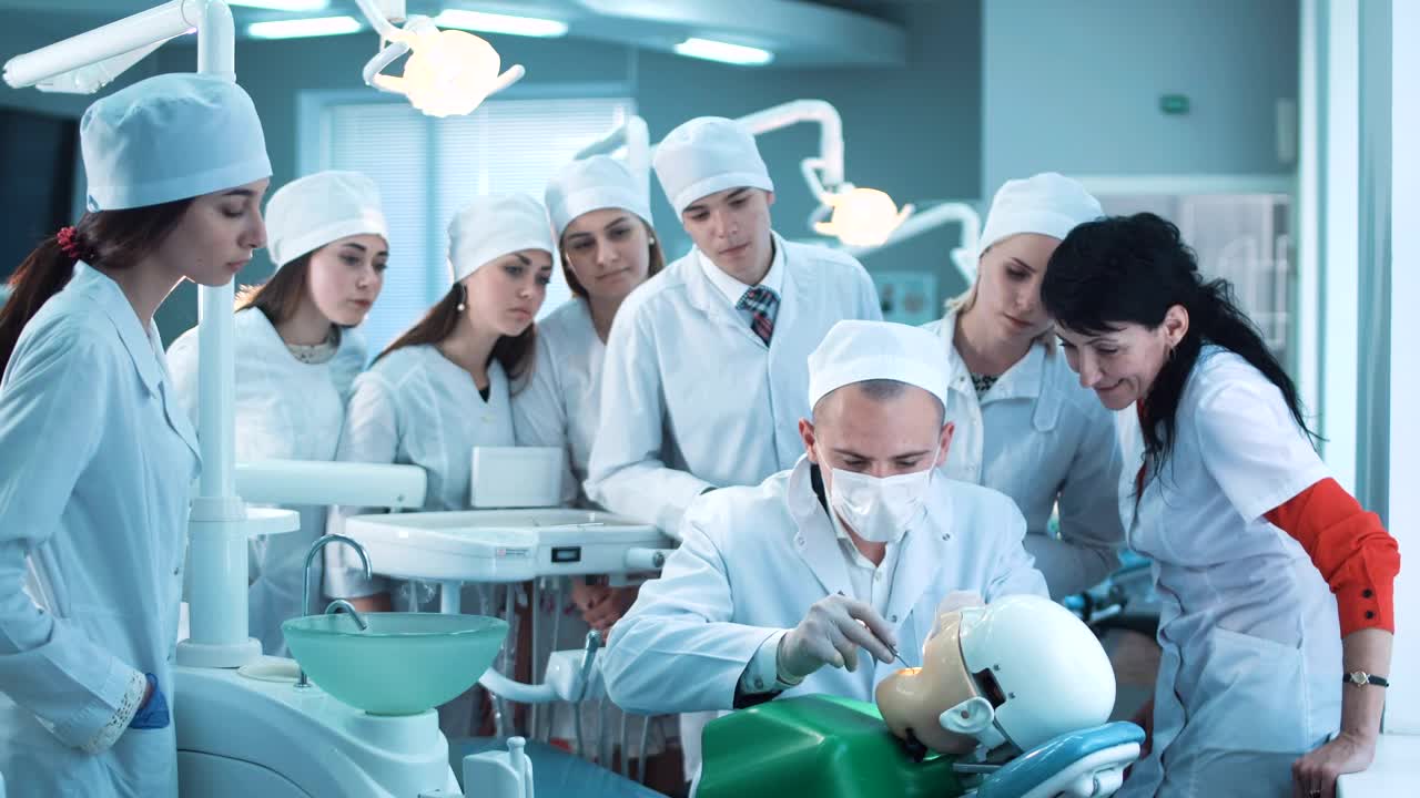 Stock Video Dental Students Practicing With Dummy Live Wallpaper For PC