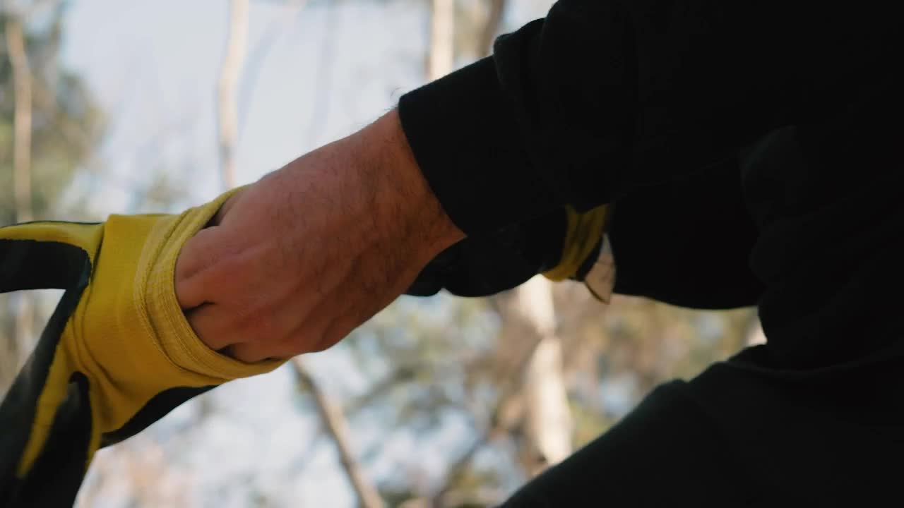 Stock Video Cyclist Puts On Gloves And Before Starting To Ride Live Wallpaper For PC