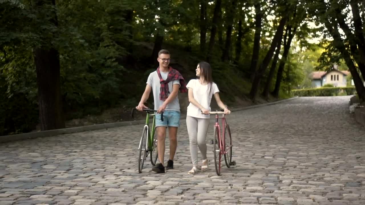 Stock Video Couple Walks In The Park While Talking Live Wallpaper For PC