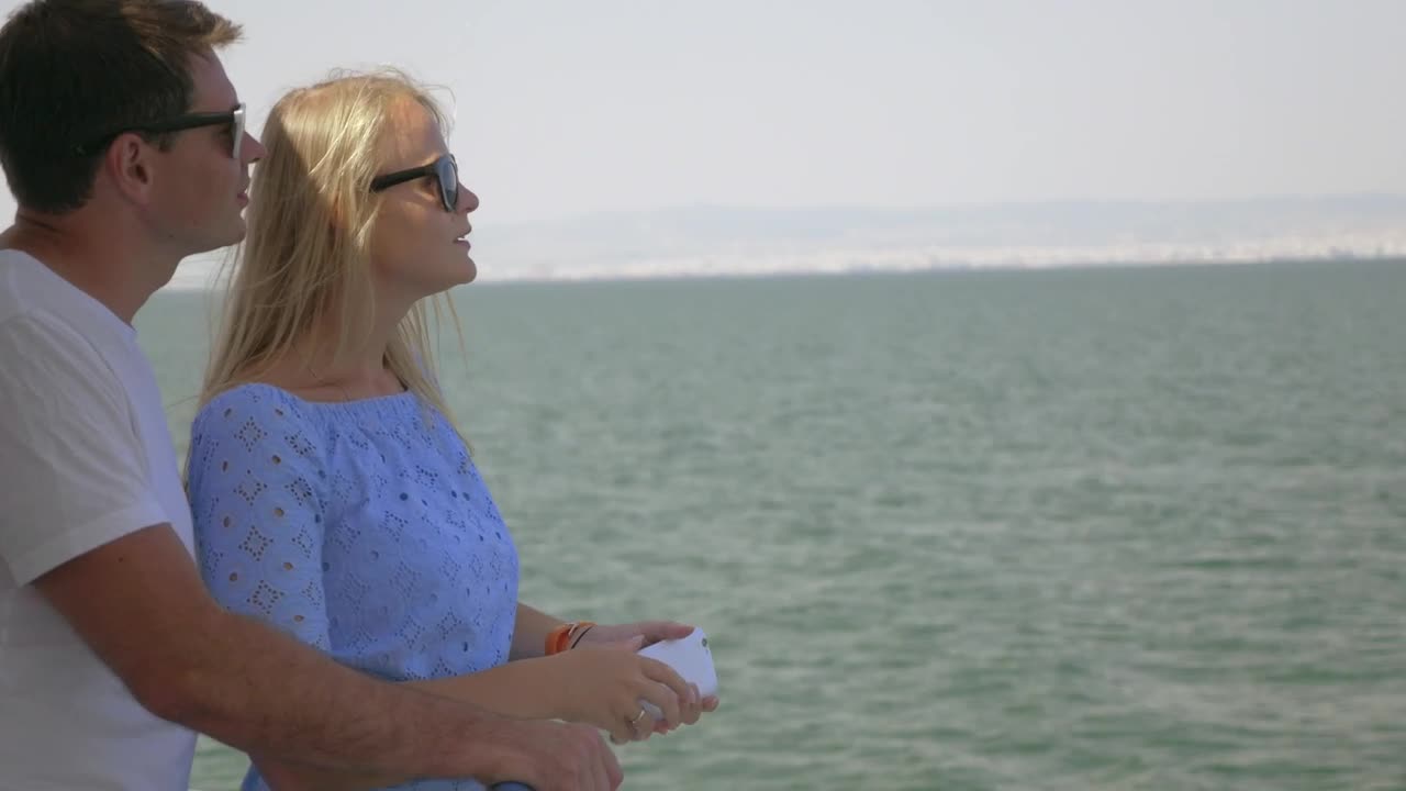 Stock Video Couple Taking A Photo Together On A Boat Live Wallpaper For PC