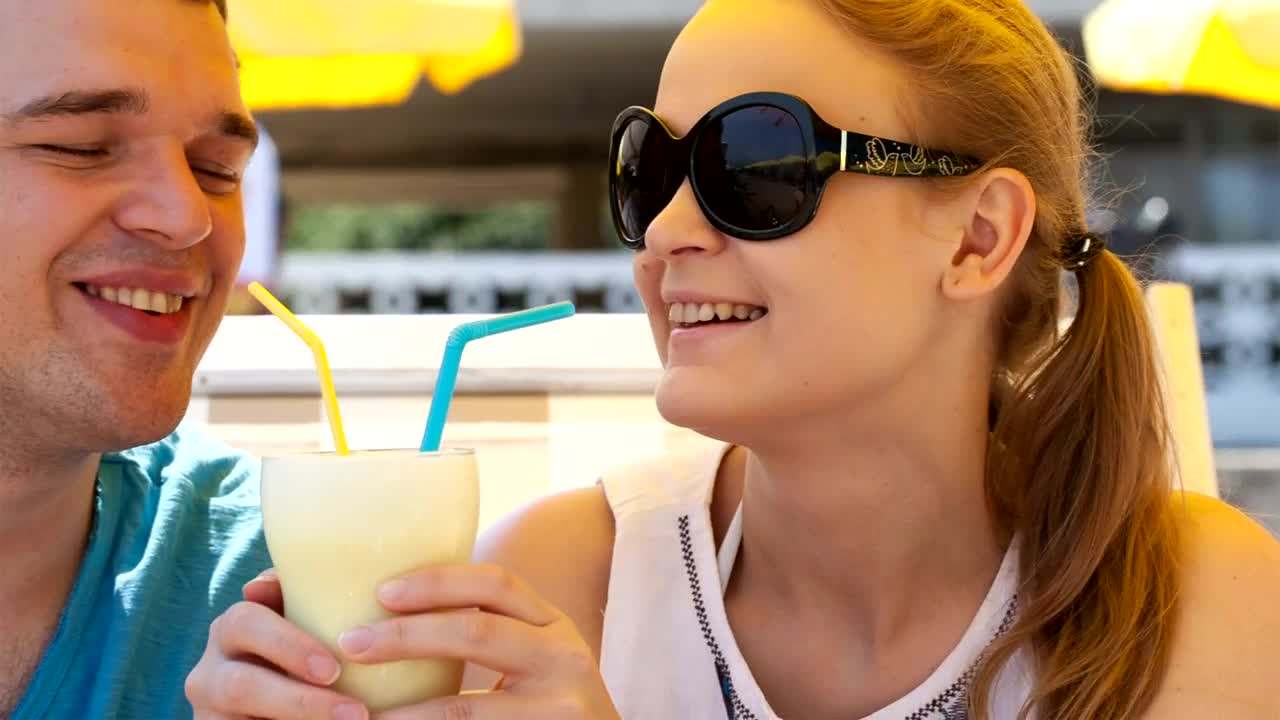Stock Video Couple Sharing A Drink In The Sun Live Wallpaper For PC