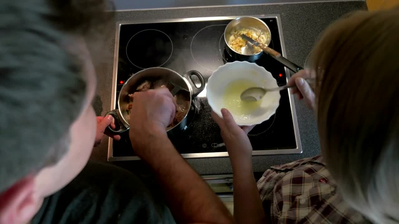 Stock Video Couple Preparing A Meal Together Live Wallpaper For PC