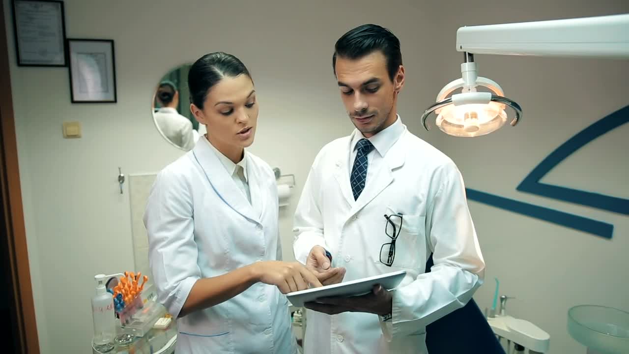Stock Video Couple Of Dentists Checking An X Ray Live Wallpaper For PC