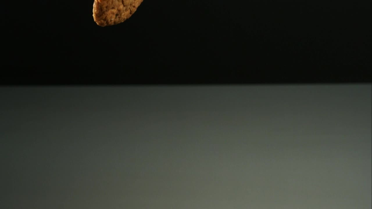 Stock Video Cookies Falling Into A Mirror Surface Live Wallpaper For PC