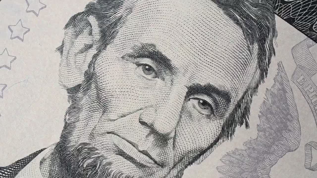 Stock Video Face Of Abraham Lincoln On A Spinning Banknote Live Wallpaper For PC