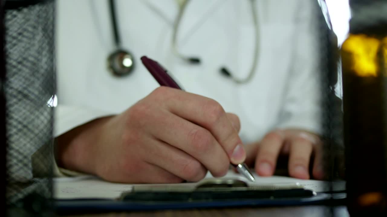 Stock Video Doctor Writing Down A Prescription Live Wallpaper For PC