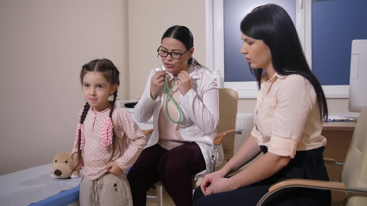 Stock Video Doctor Examining A Sick Child Live Wallpaper For PC