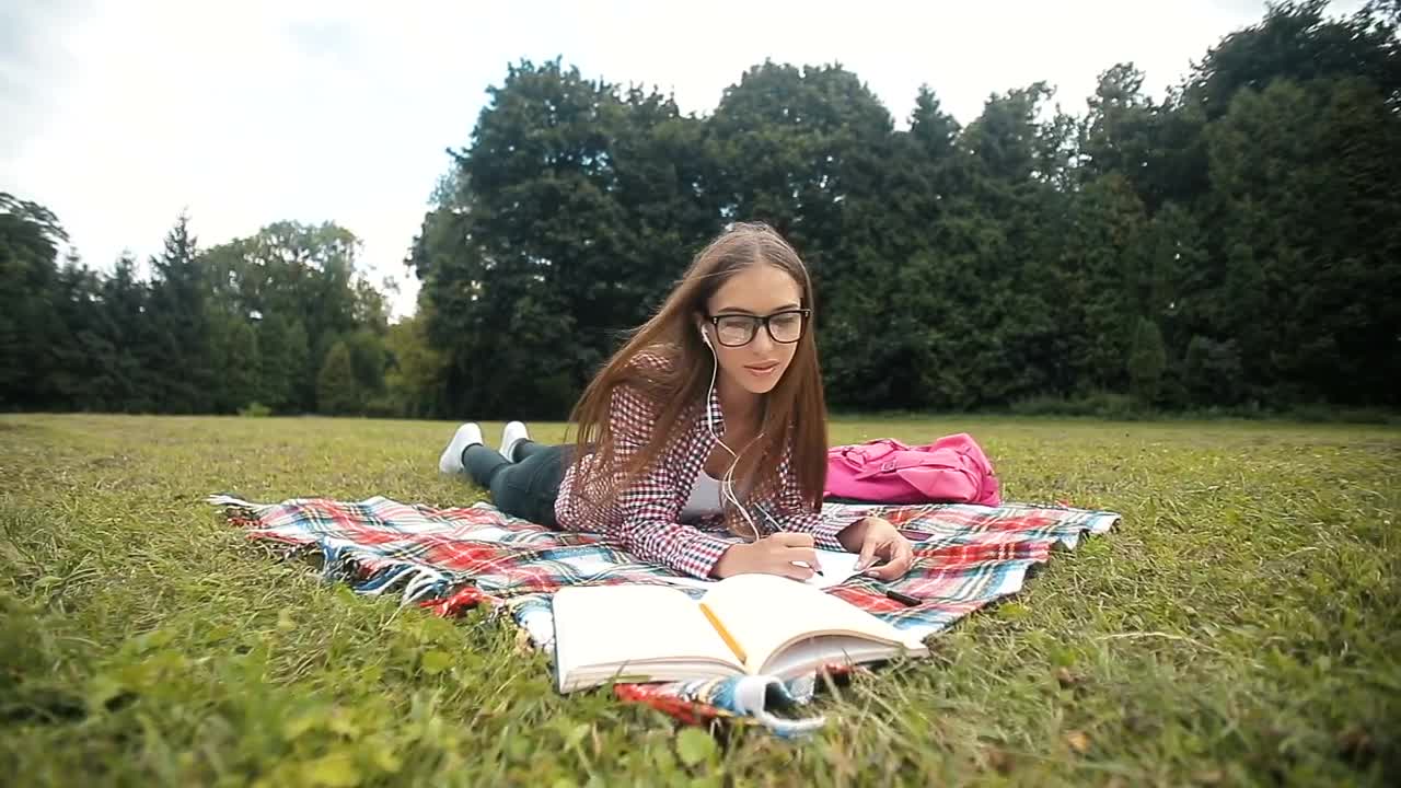 Stock Video Distance Education Student Listens To Lecture In Park Live Wallpaper For PC