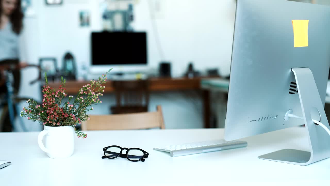 Stock Video Desk View Of Woman Walking Bike Into Modern Office Live Wallpaper For PC