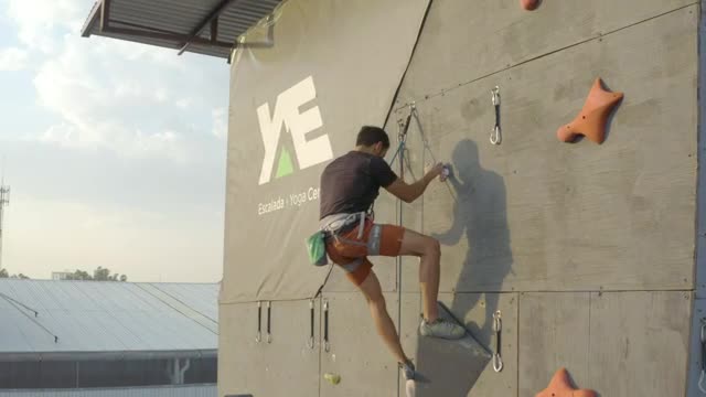 Stock Video Descending A Large Mountaineering Wall With A Rope  Smal Live Wallpaper For PC