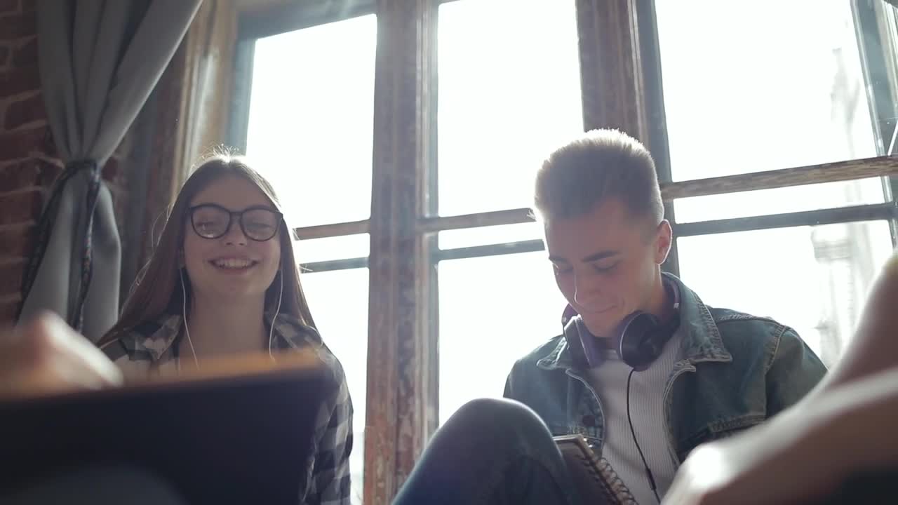 Stock Video Friends Celebrate Win With A Hi Five In Sunlit Room Live Wallpaper For PC