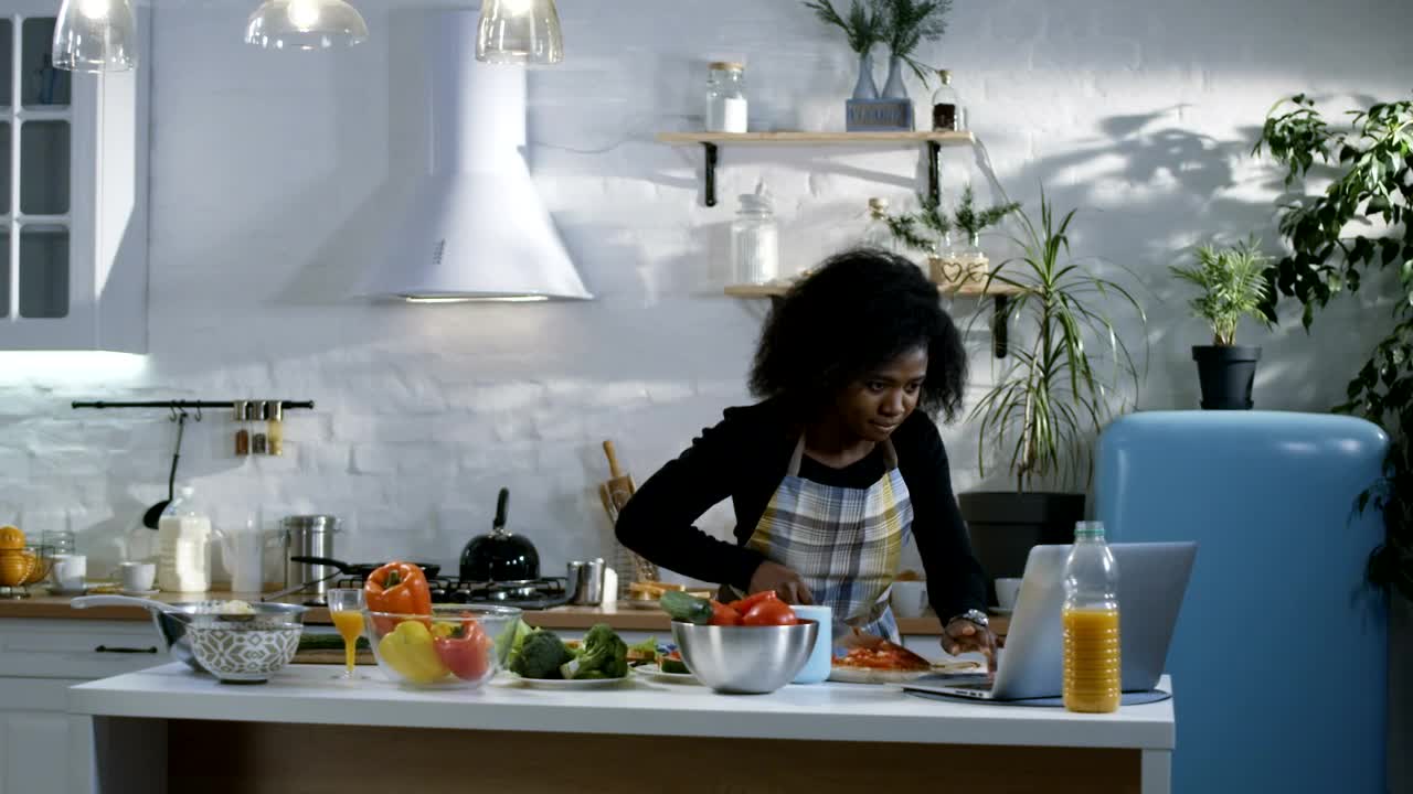 Stock Video Following A Food Tutorial In The Kitchen Live Wallpaper For PC
