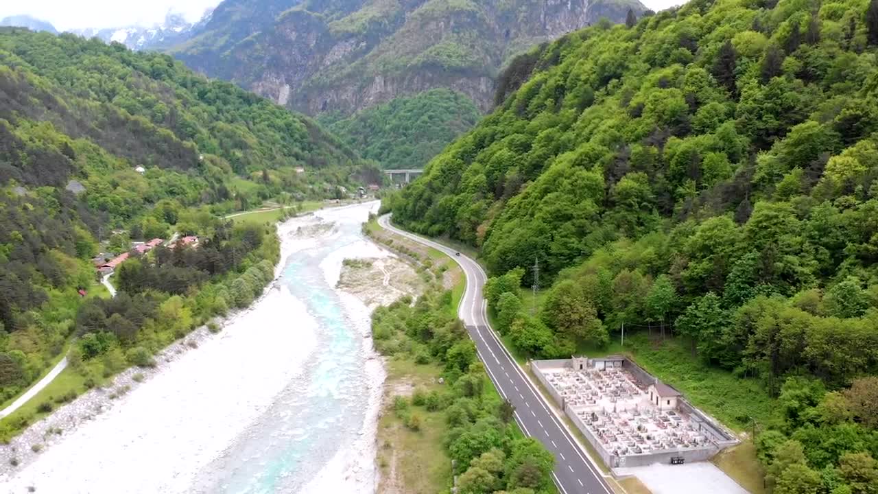 Stock Video Flying Over A Cemetery And A Road By The River Live Wallpaper For PC