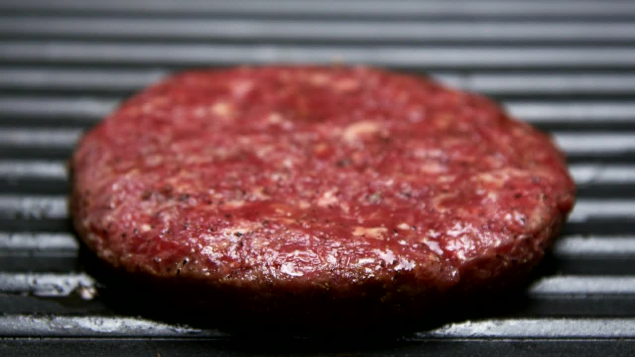 Stock Video Flipping A Hamburger On The Grill Live Wallpaper For PC