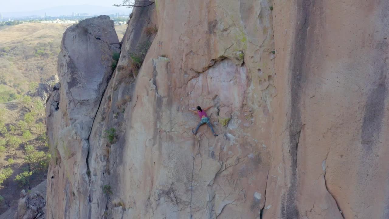 Stock Video Female Mountaineer Climbing On Top Of A Mountain Live Wallpaper For PC