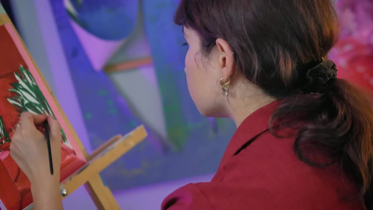 Stock Video Female Artist Painting A Picture In A Workshop 4160 Live Wallpaper For PC