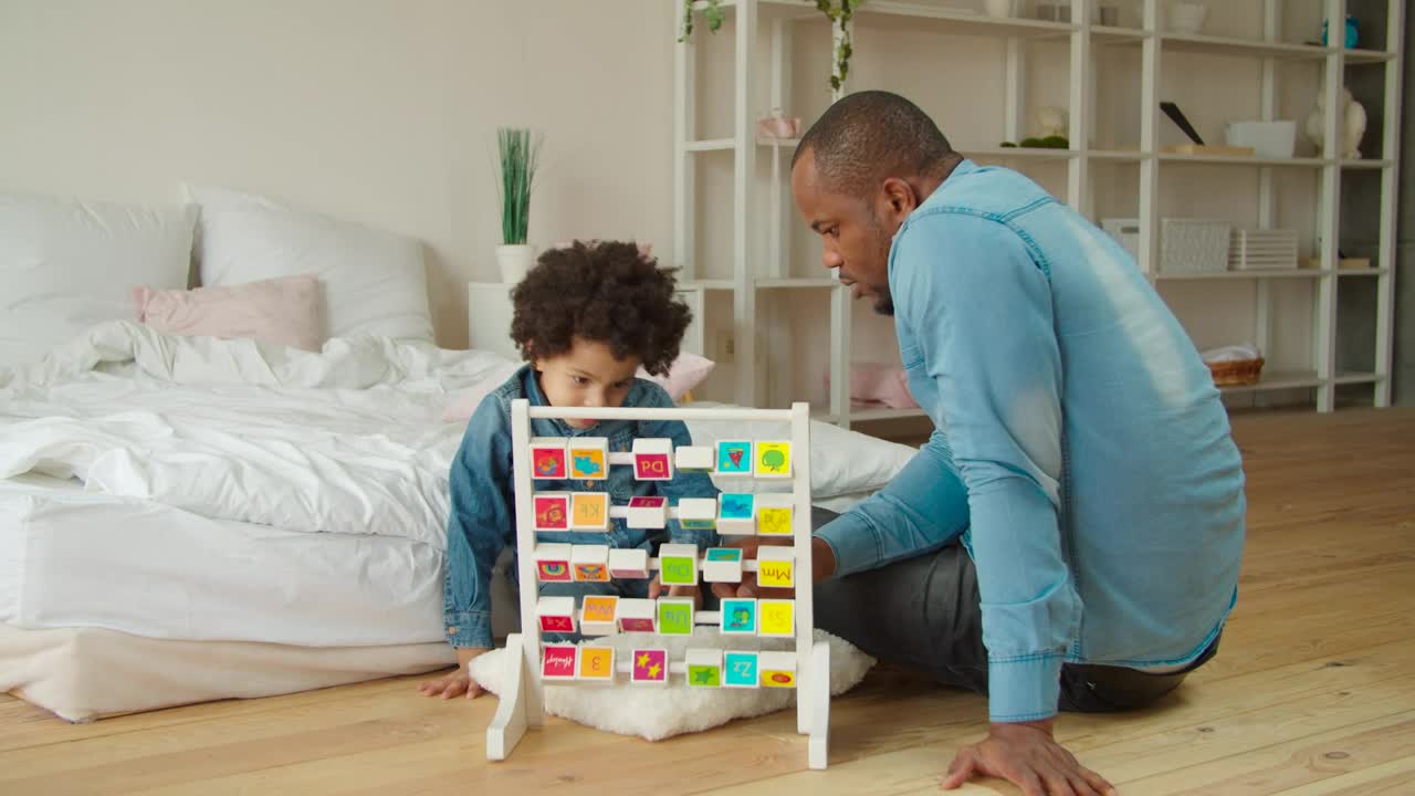 Stock Video Father And Son With A Didactic Toy Live Wallpaper For PC