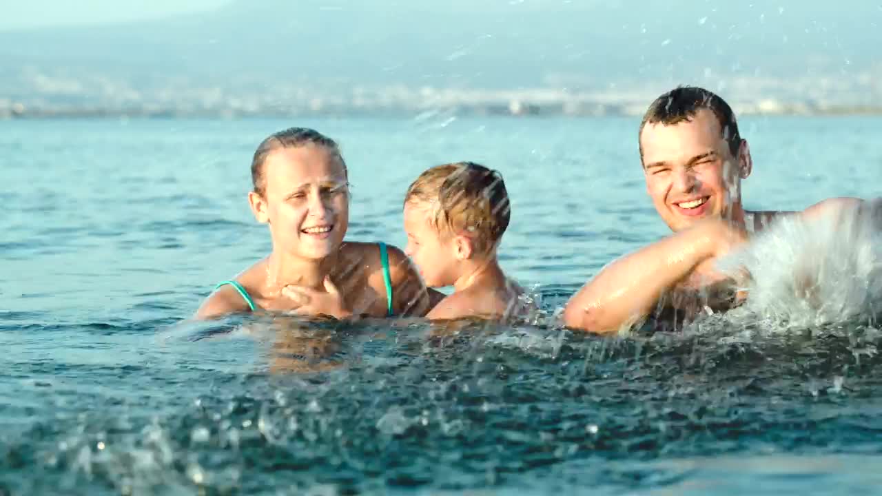 Stock Video Family Splashing The Camera Live Wallpaper For PC