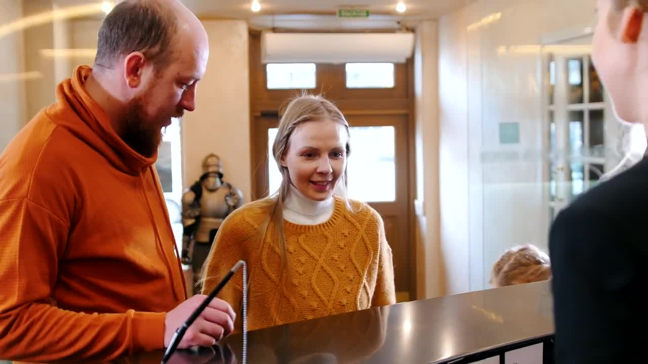 Stock Video Family Doing Check In At The Hotel Live Wallpaper For PC