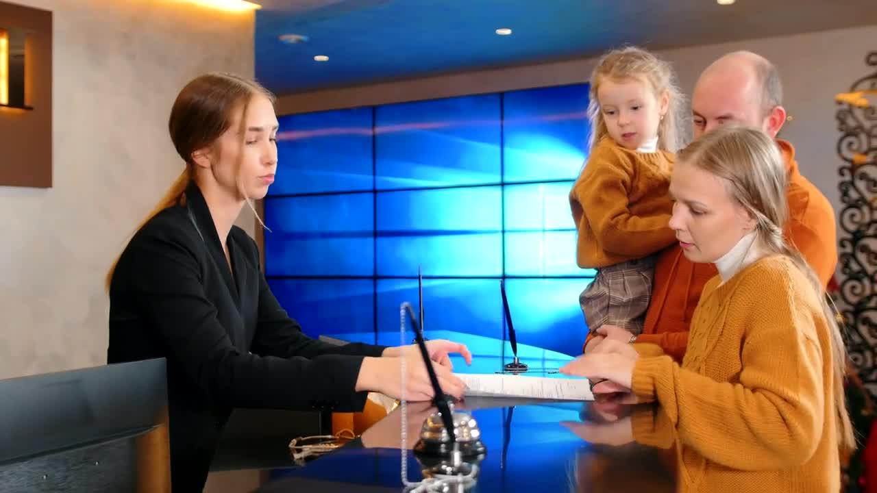 Stock Video Family At A Hotel Reception Checking In Live Wallpaper For PC