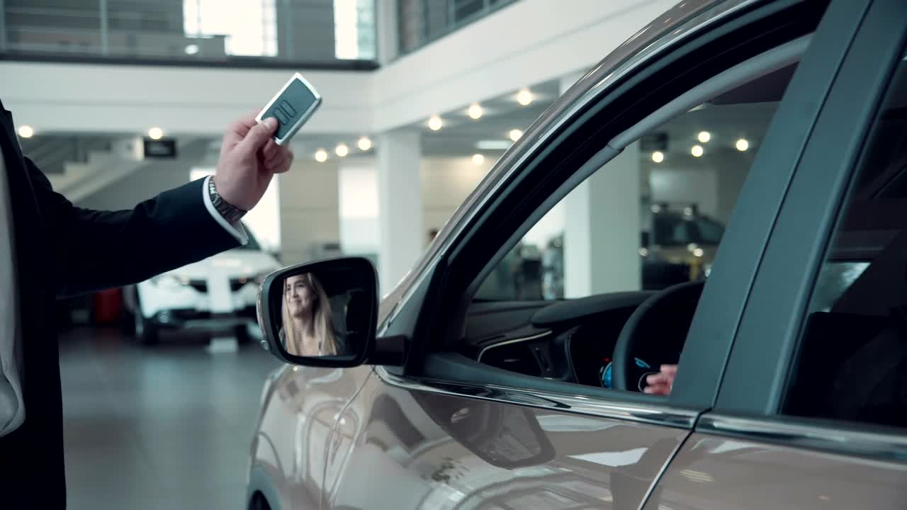 Stock Video Giving A Car Key To Client Live Wallpaper For PC