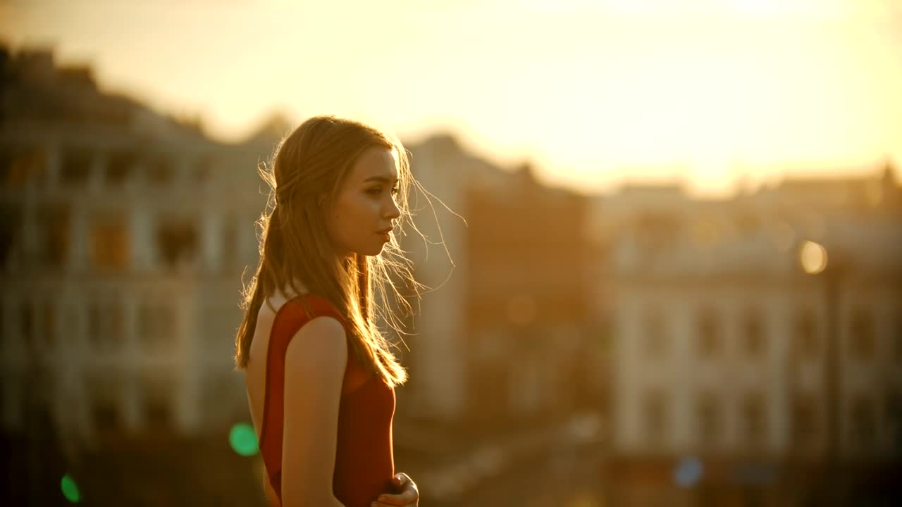 Stock Video Girl Under Sunlight On Top Of A Building Live Wallpaper For PC