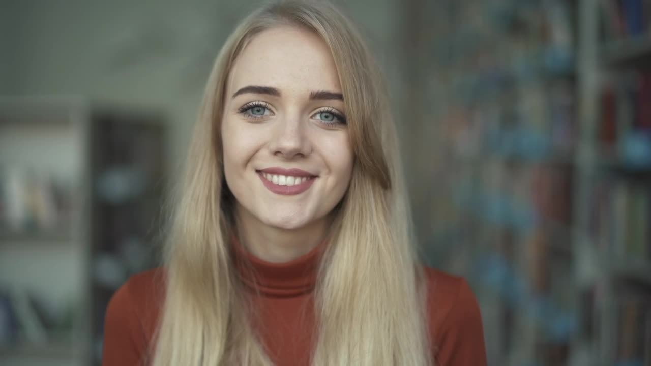 Stock Video Girl Smiling Portrait In The Library Live Wallpaper For PC