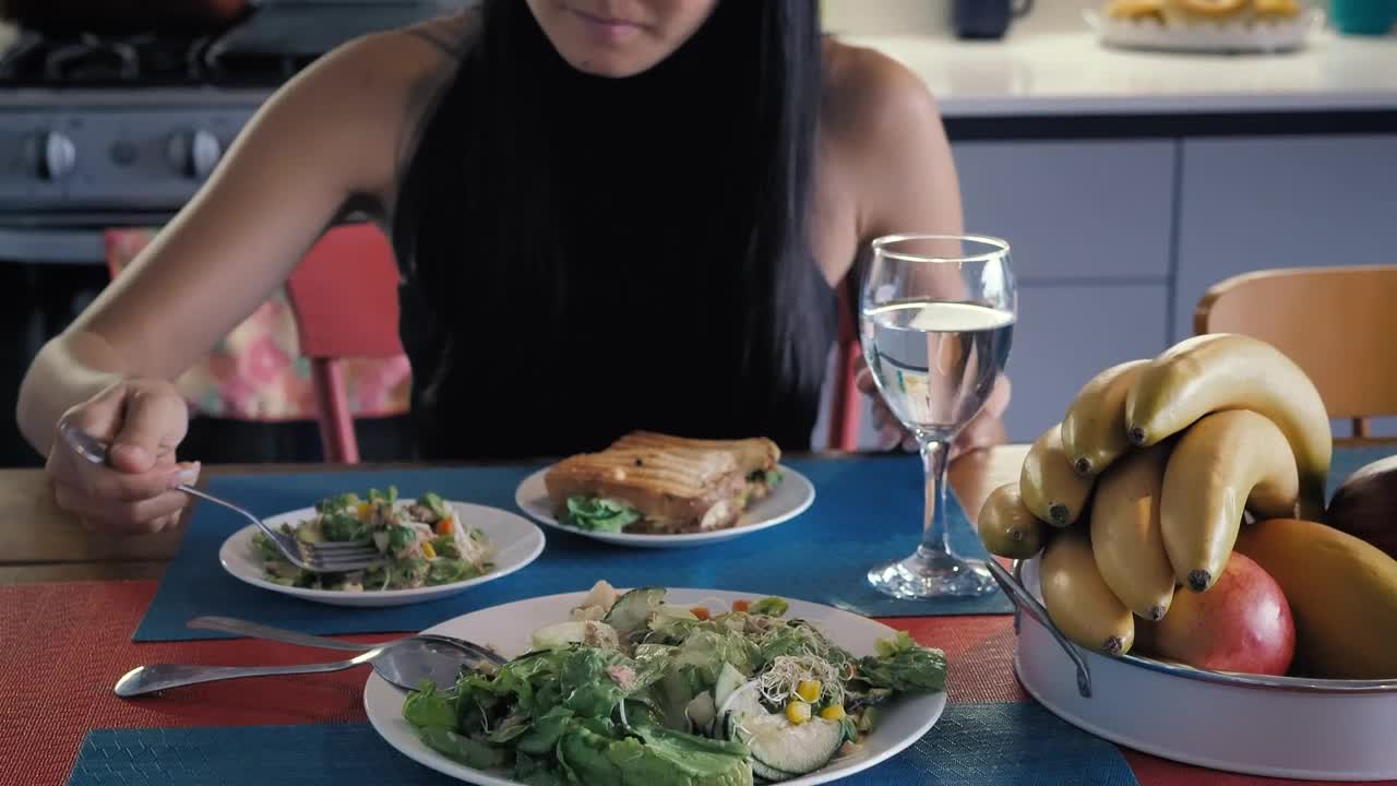 Stock Video Girl Eating Salad In Her Kitchen Dining Room Live Wallpaper For PC