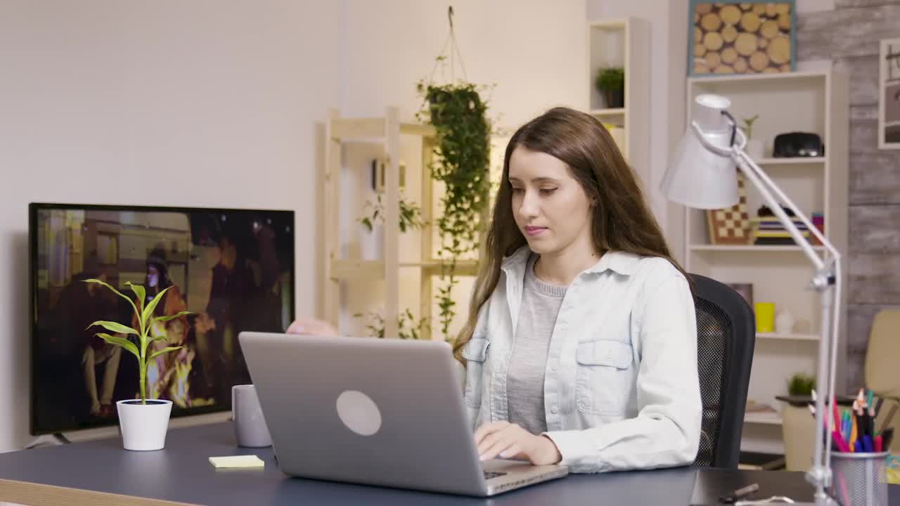 Stock Video Girl Drinking Coffee And Typing On Laptop At Home Live Wallpaper For PC