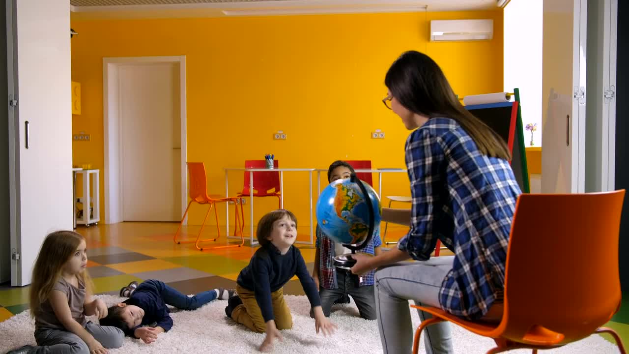 Stock Video Geography Teacher With Young Students Live Wallpaper For PC