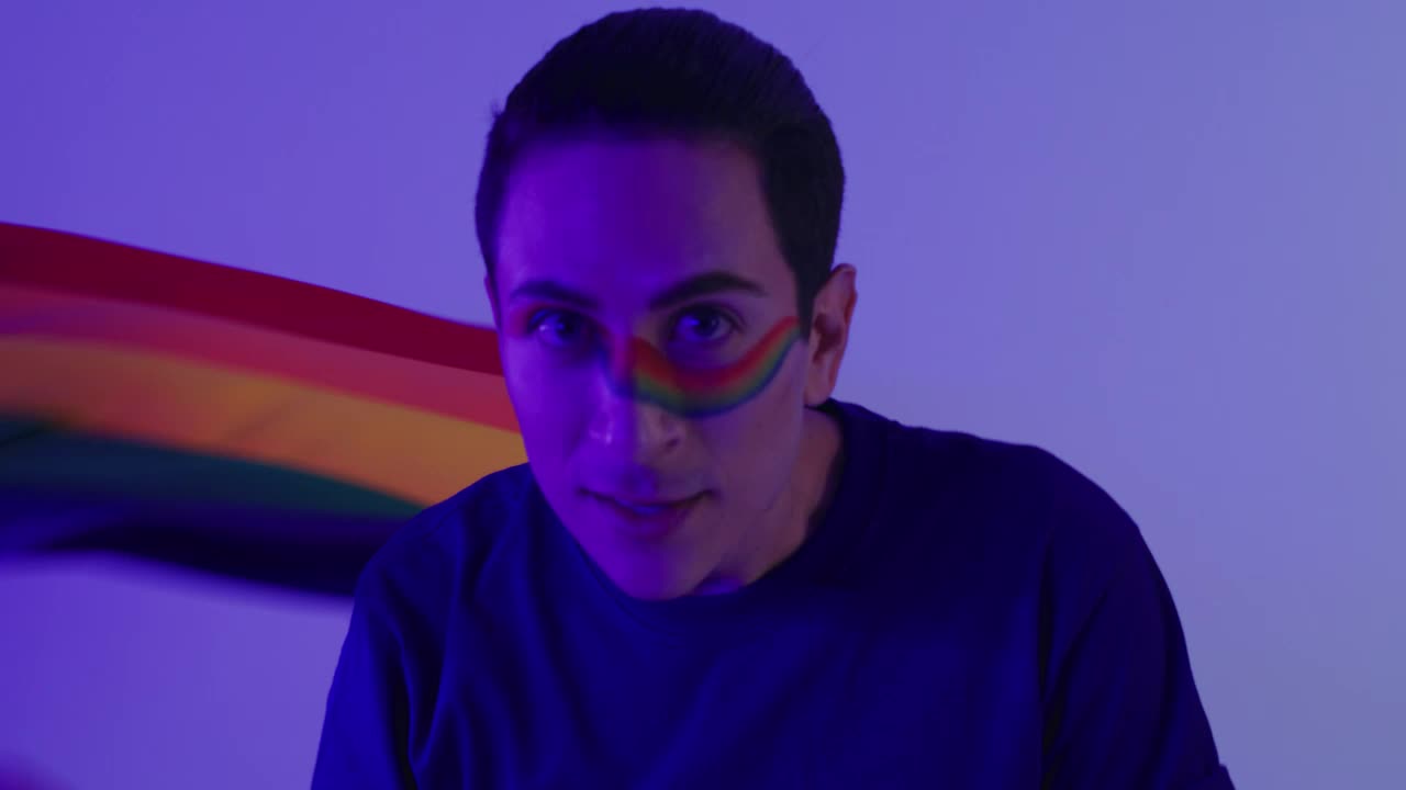 Stock Video Gay Man Playing With Lgbt Pride Flag Live Wallpaper For PC