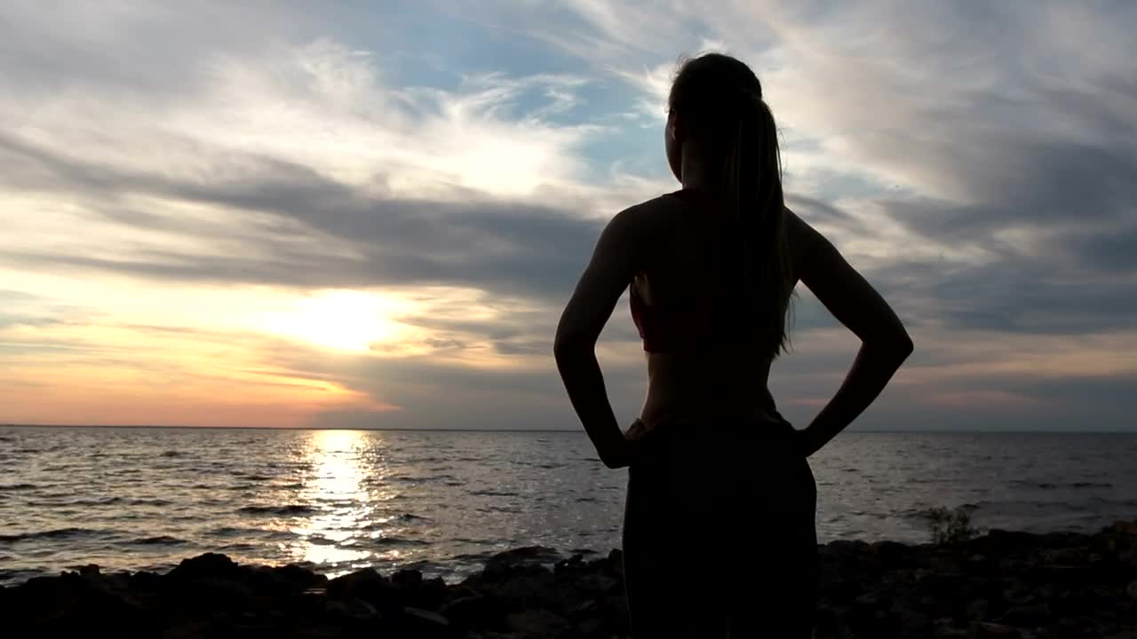 Stock Video Lady Enjoying The Sunset Animated Wallpaper
