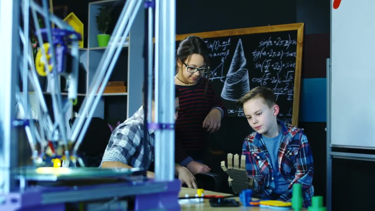 Stock Video Kids Try A Cardboard Robotic Arm Animated Wallpaper