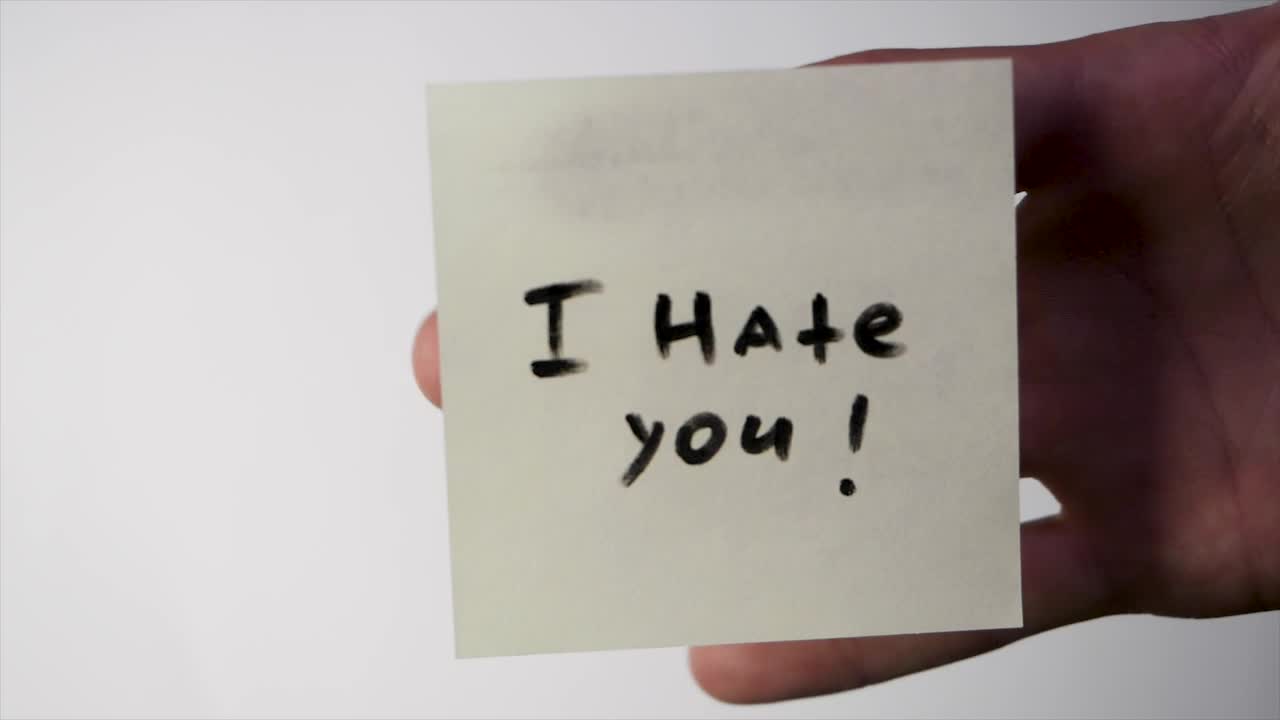 Stock Video Insult Written On A Note Animated Wallpaper