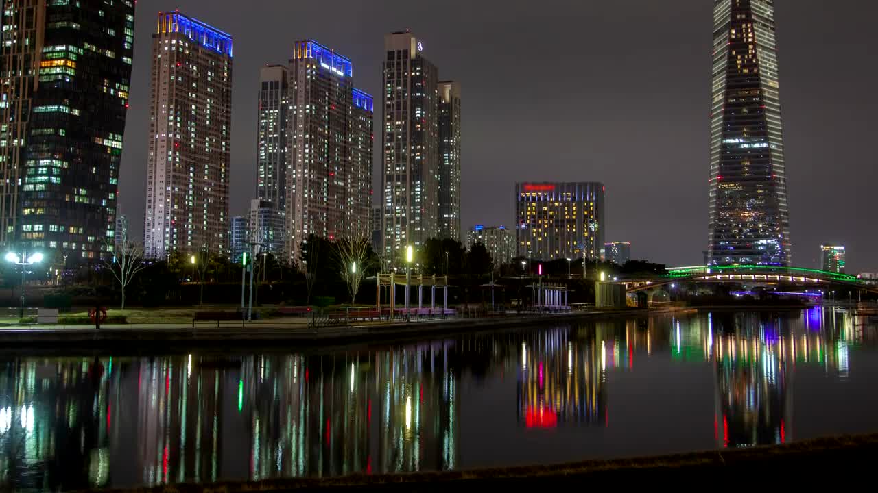 Stock Video Huge Skyscrapers Illuminated In Colors At Night Animated Wallpaper