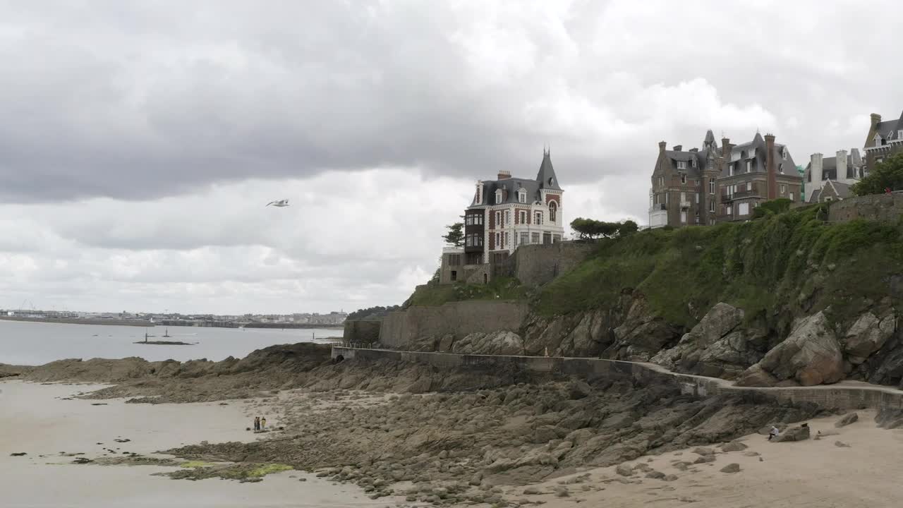 Stock Video Houses On The Edge Of A Coastal Cliff Animated Wallpaper
