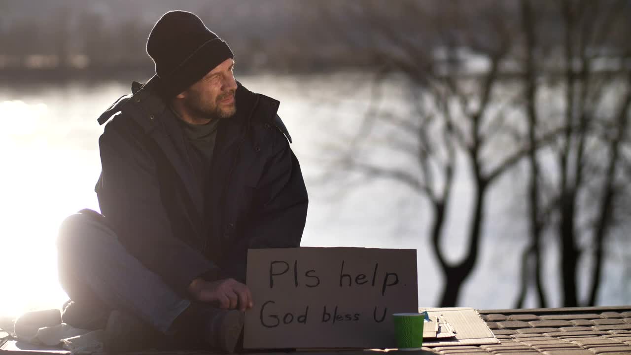 Stock Video Homeless Man With A Sign Animated Wallpaper