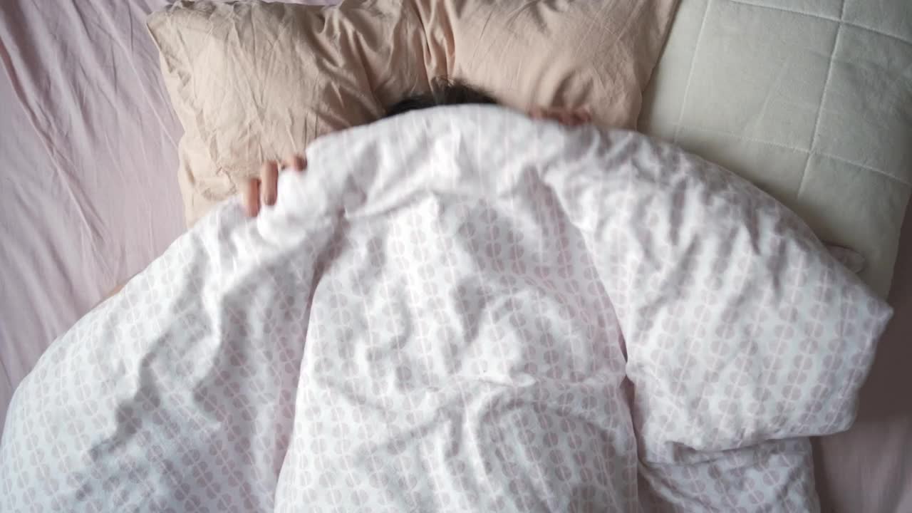 Stock Video Happy Woman Lying On Her Bed Animated Wallpaper