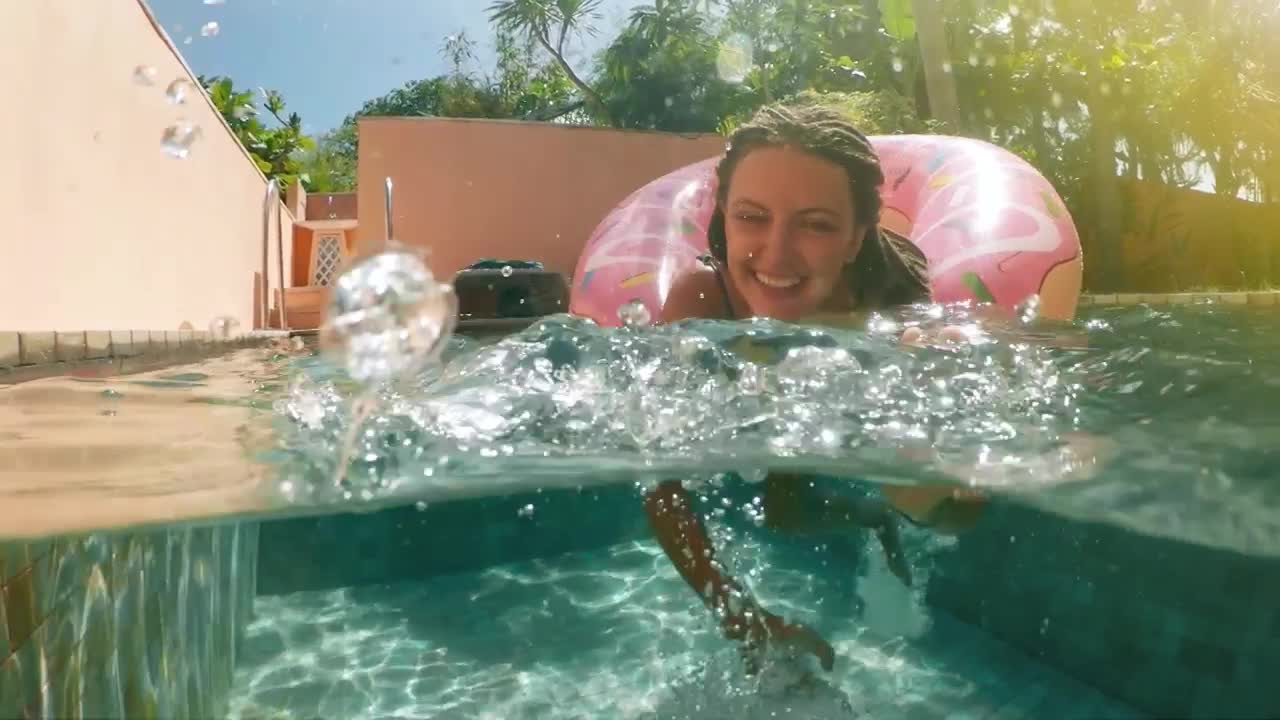 Stock Video Happy Woman In The Swimming Pool Enjoying Vacations Animated Wallpaper